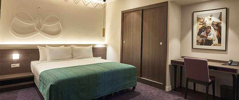 Une chambre du M Suite Hotel à Dar El Beïda